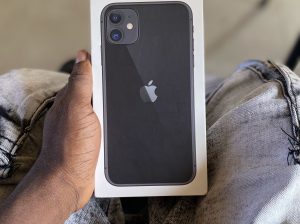 iPhone 11 locked. used with box. 64gig. everything working perfectly